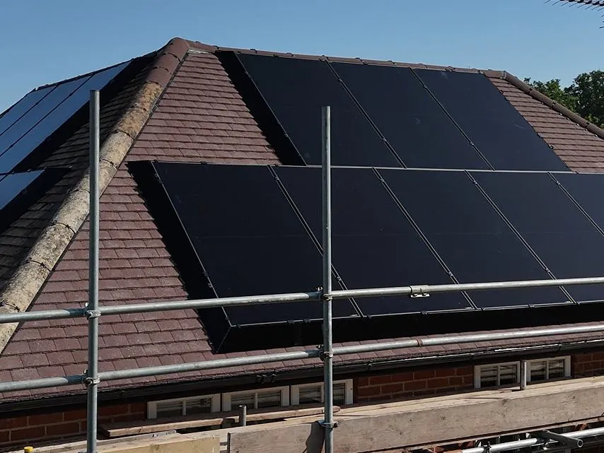 All-black solar panels installed across a tiled roof by SolarFX