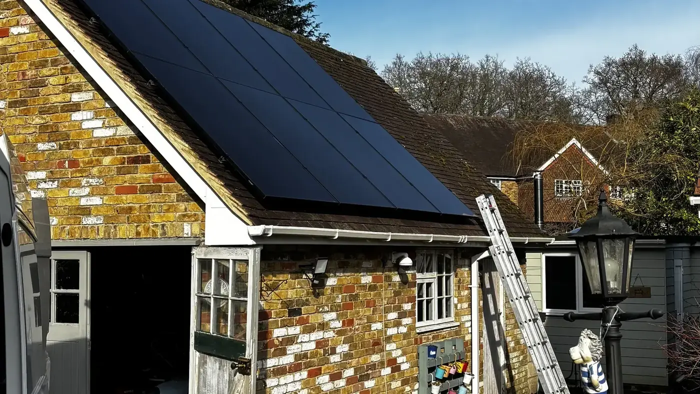 All-black array on a clay-tiled roof