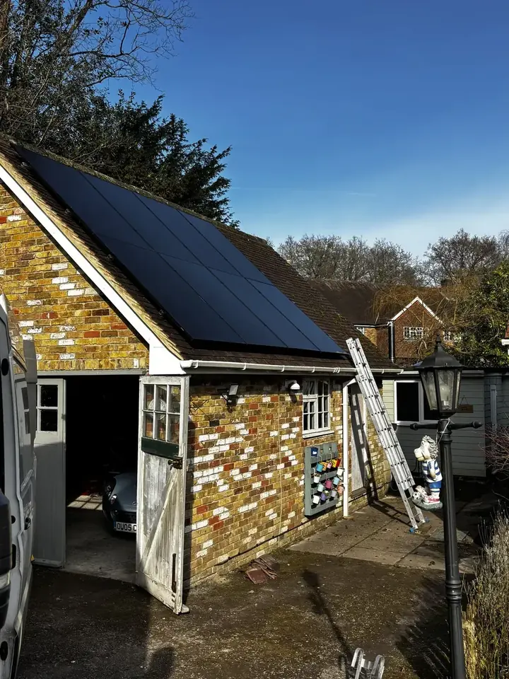 Completed all-black AIKO solar array on a clay-tiled roof in Tadley