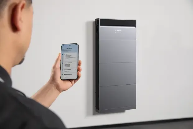 Installer commissioning an Anker SOLIX X1 through the app